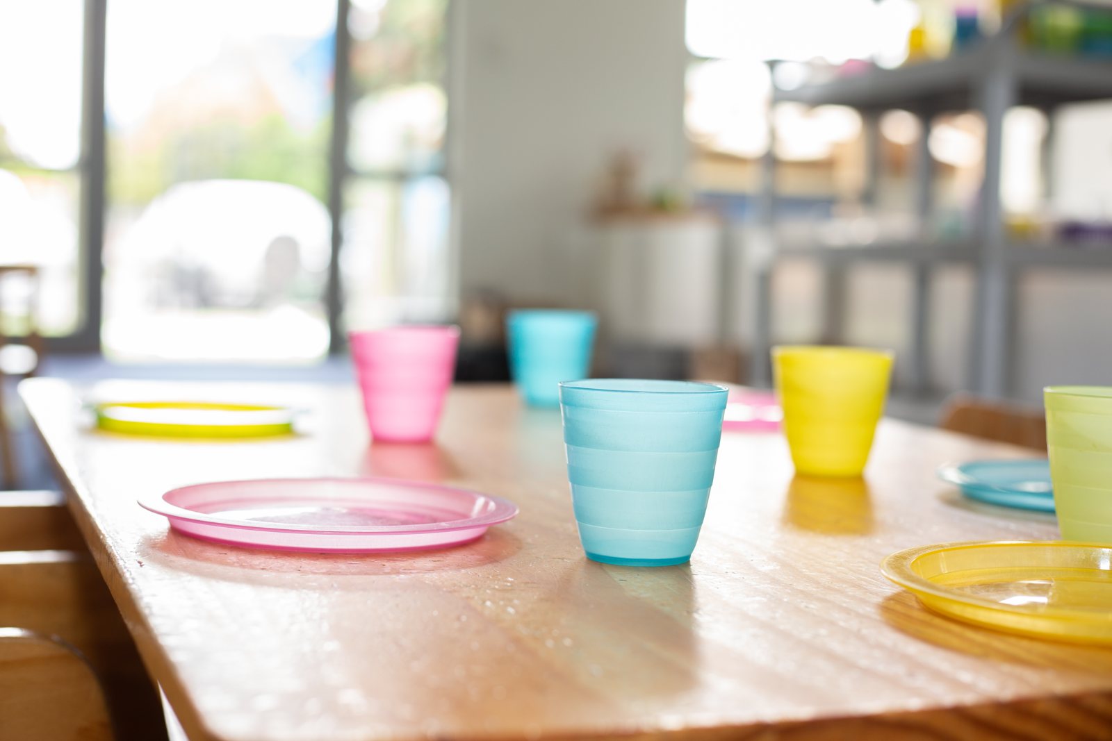 A table set for kai at Little Parrots, with cups and plates ready